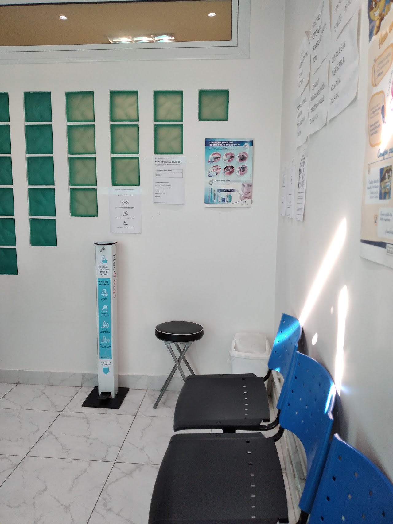 A modern dental clinic reception area and front desk